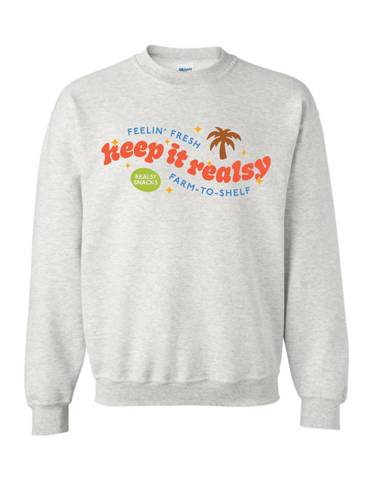 Sweatshirt with "Keep it Realsy" quote on front